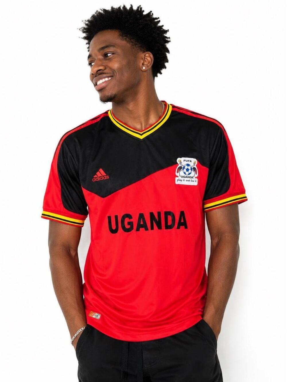 Adidas Uganda 2014 World Cup home jersey in red with black shoulders